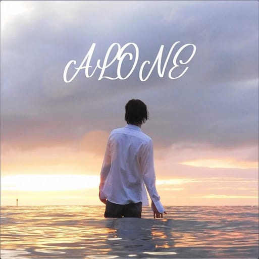 Screenshot Album art for Alone by Andy LP, depicting a man in a dress shirt and pants wading in the ocean.